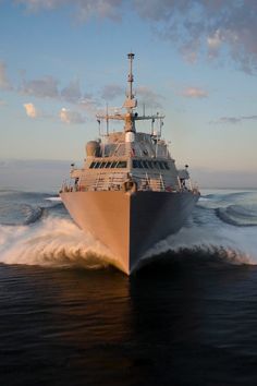 a large boat is traveling through the water