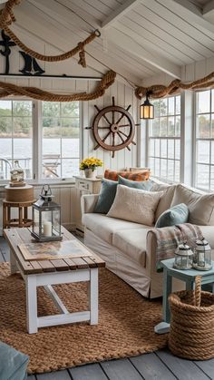 a living room filled with lots of furniture and decor on top of a wooden floor