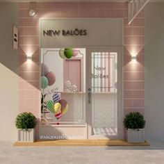 a store front with pink tiles and potted plants on the outside wall, along with new baloes