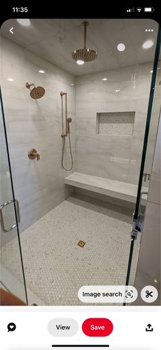 a bathroom with a walk in shower next to a bathtub and toilet paper dispenser