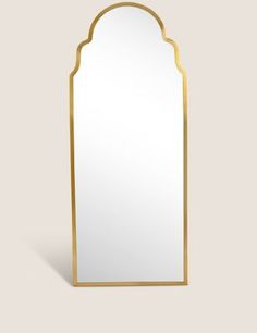 an ornate gold framed mirror on a white background