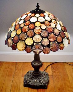 a lamp that is on top of a wooden floor