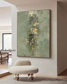 a painting hanging on the wall in a living room