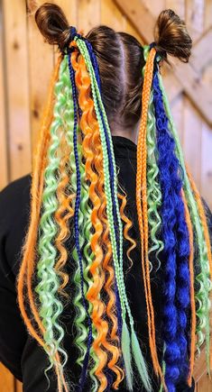 Custom made synthetic festival ponytail extension. Mix of twist and seal dreads, braids and waves. Made with quality kanekalon synthetic hair. Ponytail extensions are great for a temporary upgrade for any outing. 8 strands per pony. 23 inches long. Purple, orange and green. Can add or eliminate any color. Fully customizable, send me a message with specifications. Festival Ponytail, Hair Ponytail, Ponytail Extension, Halloween Theme, Purple Orange, 8 M, Synthetic Hair, Halloween Themes, Halloween Shopping