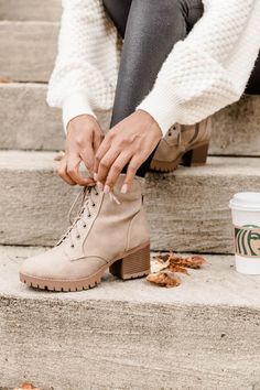 These sassy taupe boots are made for fun days at the pumpkin patch! These lovely shoes go with everything from flirty fall midi dresses to jeans and a cozy sweater. We love the lace up style and the unique taupe suede-like exterior is sure to stand out from the crowd! Made of all man made materials. Dry sponge clean. Colors will vary from different devices. If you are returning a pair of shoes: Shoe boxes must be encased in another box for shipping to protect the items. If you send shoes back wi Fall Midi, Cocktail Dress Wedding Guest, Taupe Boots, Midi Dress Fall, Shoe Boxes, Trendy Winter, Maternity Shops, Wedge Sneakers, Cozy Sweater