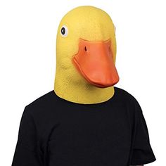 a man wearing a rubber duck mask on his head and black shirt with orange beak