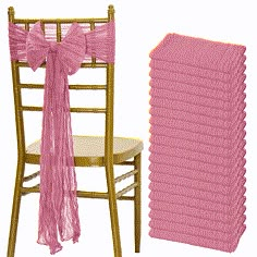 a chair with pink chiffon ruffles on it next to a stack of chairs