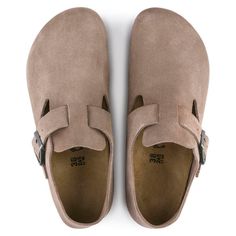 Anatomically shaped footbed Upper: suede Footbed lining: suede Sole: EVA Details: individually adjustable metal pin buckle “Made in Portugal” One of the first closed-toe styles from BIRKENSTOCK, The London is the epitome of simplicity with clean lines and an adjustable buckle strap. The iconic footbed provides signature comfort and support. With an easy fit and feel, it boasts a natural, rustic look with a soft suede upper Birkenstock London, Birkenstock Madrid Big Buckle, Taupe Shoes, Mens Beach Shirts, Find My Friends, Mens Clogs, European Shoes, London Brands, Clogs Style