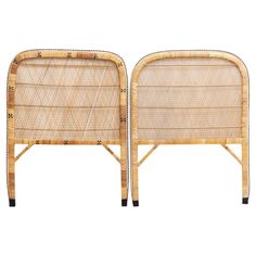 a pair of bamboo headboards with black legs