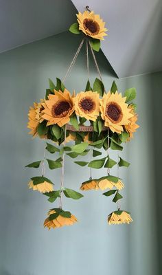 the sunflowers are hanging from the ceiling