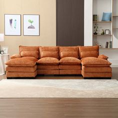 a living room with a large sectional couch