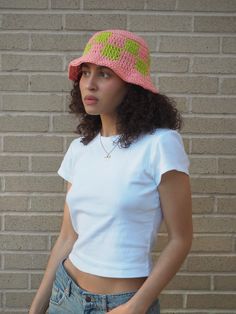 Crochet Pink & Green Checkered Bucket Hat Handmade crochet bucket hat made with 100% cotton yarn. Features pink and green color way with checkered design. Measurements: 8" height, 19" circumference, 1" brim Care Instructions: Hand wash only, lay flat to dry Fitted Green Cotton Hat, Fitted Crochet Bucket Hat For Summer, Casual Crochet Mini Hats For Spring, Casual Fitted Crochet Hat With Curved Brim, Fitted Crochet Spring Cap, Fitted Crochet Cap For Spring, Fitted Cotton Bucket Hat, Casual Green Cotton Crochet Hat, White Brimmed Cotton Crochet Hat