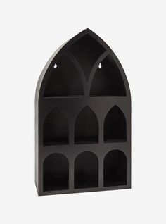 a black shelf that has several shelves on it and one is open to show the inside