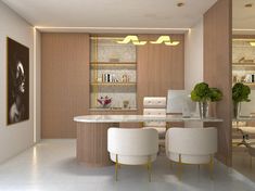 an elegant dining room with marble table and white chairs, built in shelving units