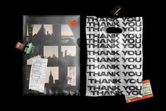 an image of thank you bags with cityscape in the back and on the front