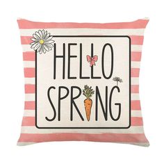 a pink and white pillow with the words hello spring on it