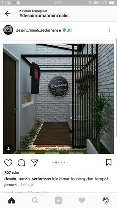 an instagram page with a brick wall and black iron gate