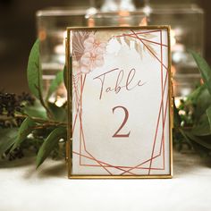 the table numbers are displayed in gold frames