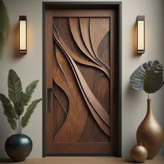 a wooden door with decorative designs on the front and side panels, next to two vases