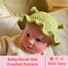 a baby wearing a crochet hat on top of a couch with text overlay that says, baby shek hat crochet pattern