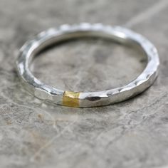 MADE TO ORDER - Please allow up to 5 working days from order for this ring to be shipped. Made from solid sterling silver, this square band is textured, on the face and sides, with a hammered finish & a highlight of pure 24ct gold. The ancient technique of Keum Boo (meaning 'applied gold') is used to permanently apply & bond the fine layer of pure gold to the fine silver surface of the ring, using only heat & pressure.  The whole ring is then polished to a shine. DETAILS Made from solid, recycle Boo Meaning, Alternative Wedding Ring, Gold Highlight, Hammered Gold Ring, Keum Boo, Weird Jewelry, Alternative Wedding Rings, Hammered Silver Ring, Sterling Silver Jewelry Rings