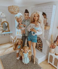 a group of dolls standing next to each other