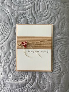 a greeting card with a ribbon on it