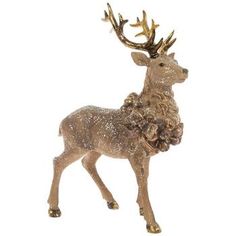 a gold deer figurine with antlers on it's back