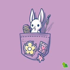 a cartoon bunny sitting in the pocket of a purple shirt with some crochet on it