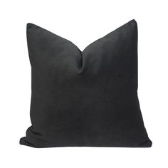 a black pillow on a white background