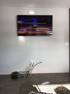 a television mounted to the side of a wall