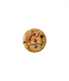 a chocolate chip cookie with m & m's on it