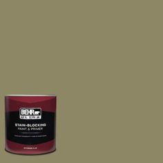 the behr paint is shown in an olive green, with black and white accents