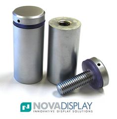 two metal cylinders with screws are shown on a white background and there is no image here to provide a caption for