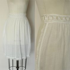 Darling vintage antique white apron circa the Victorian or Edwardian eras. Trimmed with sweet lace trim and has a ribbon insert trim waistband. Looks and feels like linen to me. Excellent vintage condition.  Mint really except that the ties that should go round the back are missing. Easy to replace with some pretty ribbon or lace, or make ties with fabric. Measurements when lying flat.  Waist to bottom hem: 23" including trim at the longest point. Please note: These are vintage, preworn and/or p Edwardian Apron, Edwardian Camisole, Victorian White Cotton Petticoat, White Adjustable Vintage Bonnet, Edwardian Insertion Lace Dress, White Apron, Dark Look, Half Apron, Apron Pockets