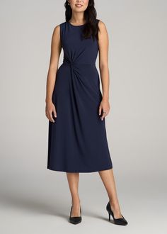 About Our Tall Women's Sleeveless Knot Front Dress Your casual companion to brunches, boardwalks and weekend getaways. This tall women's dress combines a breezy, sleeveless shape with a midi-length skirt that sits just right. Thanks to an elegant knot detail at the waist, it has an A-line shape that flatters your figure and fits it properly. It's made with a stretch-infused poly blend that's been shrinkage controlled, because it's hard enough to find tall dresses without worrying about losing le Dresses For Tall Slim Ladies, Elegant Ruched Sleeveless Dress For Beach, Spring Sleeveless Maxi Dress With Flattering Silhouette, Sleeveless Maxi Dress With Flattering Silhouette For Summer, Casual Sleeveless Midi Dress With Flattering Silhouette, Casual Sleeveless Ruched Dress, Sleeveless Midi Dress With Flattering Silhouette For Summer, Casual Sleeveless Ruched Midi Dress, Flattering Sleeveless Midi Dress For Summer