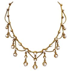 This elegant Belle Époque necklace is composed of collet set oriental pearls and rose cut diamonds connected by foxtail gold chains. The clasp is hallmarked with French assay marks, the eagle's heads. The top row is set with 17 pearls, the eleven dangling elements are set with a further 18 pearls. In all the necklace is decorated with 22 Diamonds. Historical Necklace, 1800s Jewelry, Antique Jewelry Victorian, 1920s Necklace, Vintage Chain Necklace, Festoon Necklace, Dragonfly Brooch, Antique Jewellery Designs, Jewellery Vintage