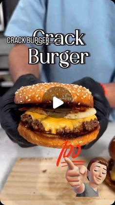 a hamburger being held up in front of a man with his finger pointing at it