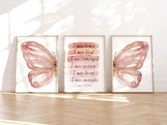 three framed art pieces with pink butterflies on them, one is saying i am brave