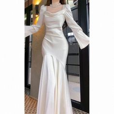 Olivia Mark - Elegant White Wedding Dress with Long Sleeves and Train Fancy Dresses For Prom, Fancy Simple Dresses, Prom Modest Dresses, Solid Color Full Length Wedding Dress, Solid Color Gown For Wedding And Prom Season, Gown For Wedding And Prom Season, Wedding Gown For Prom Season, Simple Dress For Graduation Party, Solid Satin Evening Dress For Wedding