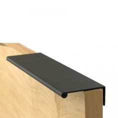 a close up of a wooden box with a black metal bar on the top and bottom