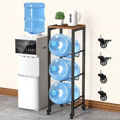 a water dispenser with three large blue bottles on it's rack