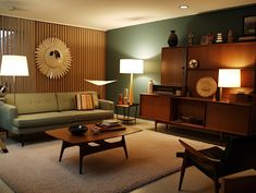 a living room filled with furniture and lamps