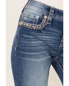 66% cotton / 14% Lyocell / 18% polyester / 2% elastane. Zip-fly with button closure. 5 pocket styling. Medium wash. Mid rise. Rugged Style, Boots For Sale, Boot Shop, Miss Me, Flap Pocket, Stretch Denim, Denim Jeans, Mid Rise, Women Jeans