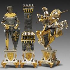 four different types of figurines are shown in gold and silver colors, including one with