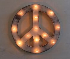 a light up peace sign on the wall