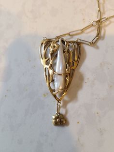 Hello! For sale is an unmarked, pure 14k floral theme and baroque pearl pendant necklace found at an estate sale. It has a Paperclip 14k chain attached, and while neither is marked 14k, acid and electronic testing confirms it is (and is not just plated or filled) Which is an interesting prospect - jewelry was required to be stamped with purity in the u.s. in early 20th century if it were being sold as that purity. I'm guessing this isn't THAT (1903) old, as it's in almost perfect condition, asid Baroque Accessories, Freeform Jewelry, Baroque Jewelry, Baroque Pearl Pendant, Pearl Necklace Vintage, Floral Theme, Almost Perfect, Pearl Pendant Necklace, Baroque Pearls