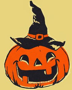 a pumpkin with a witches hat on it