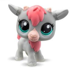 littlest pet shop figurine grey cow with pink bow on its head and eyes