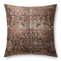 an antique rug pillow on a white background